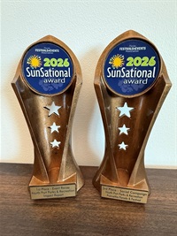 Two 2026 SUNsational Awards sitting on a table.
