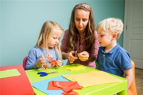Two kids with teacher
