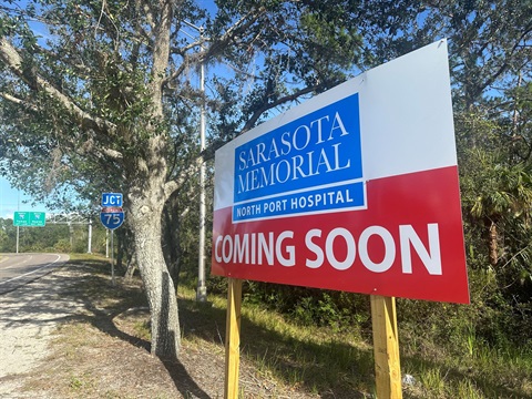 A sign that says Sarasota Memorial Hospital coming soon
