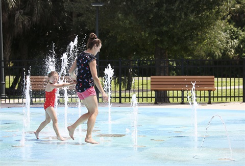 Family playing in Atwater Community Park