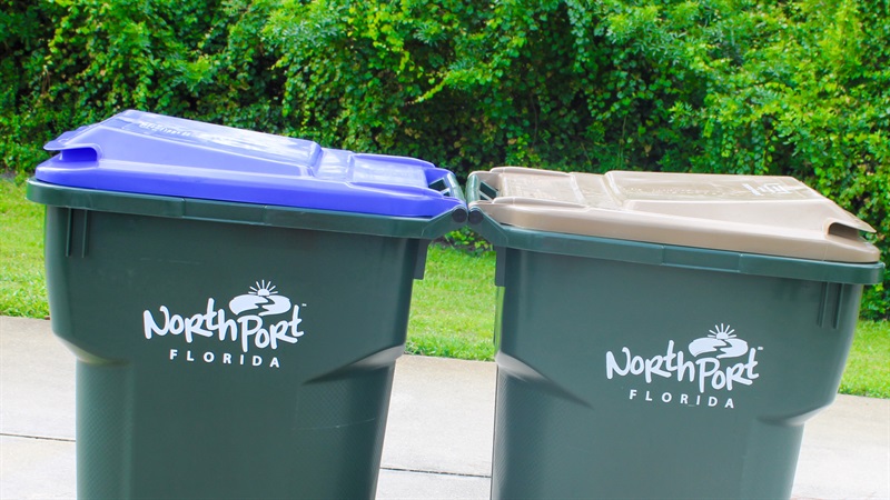 tan and blue lid recycling containers