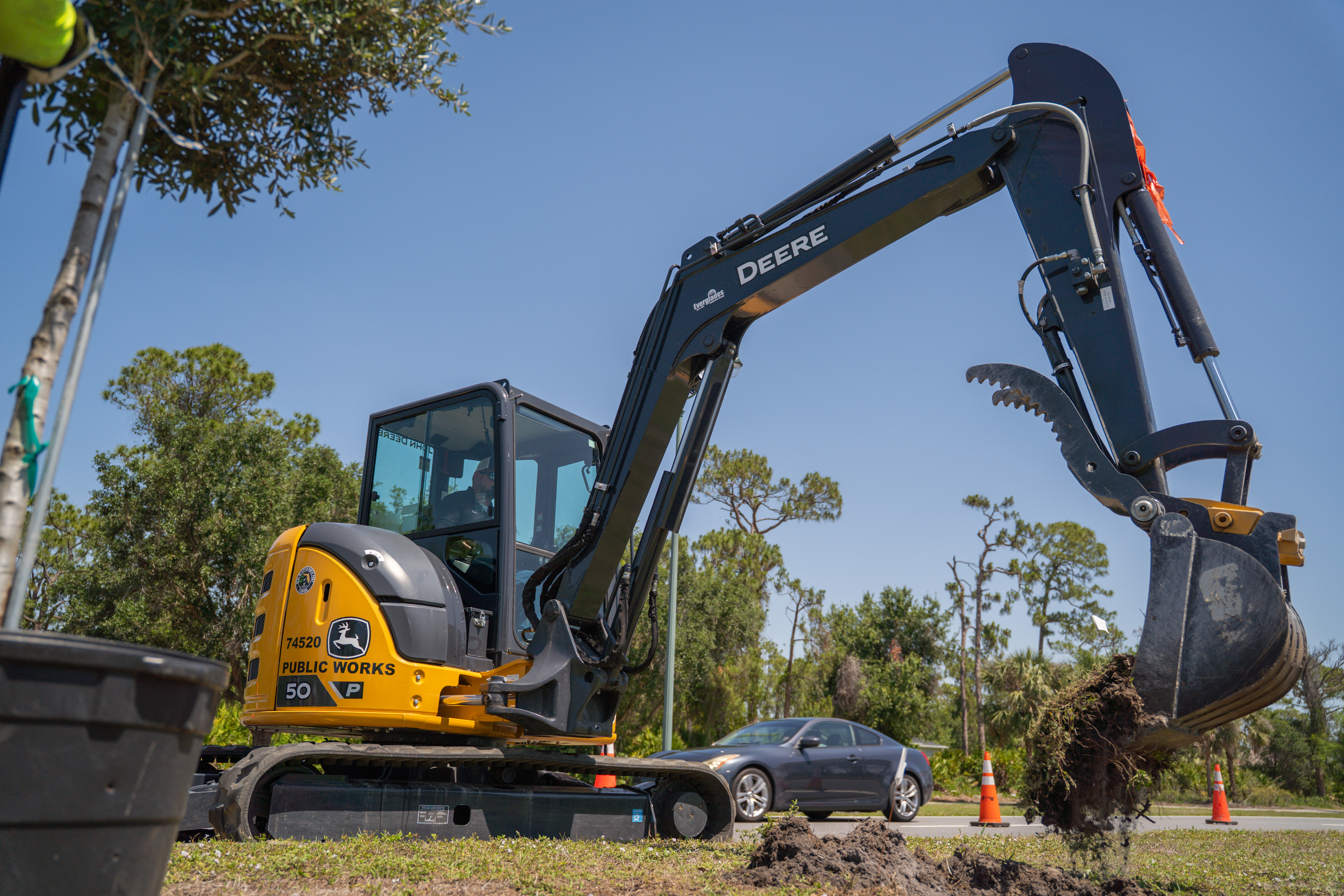Excavator set up for tree planting