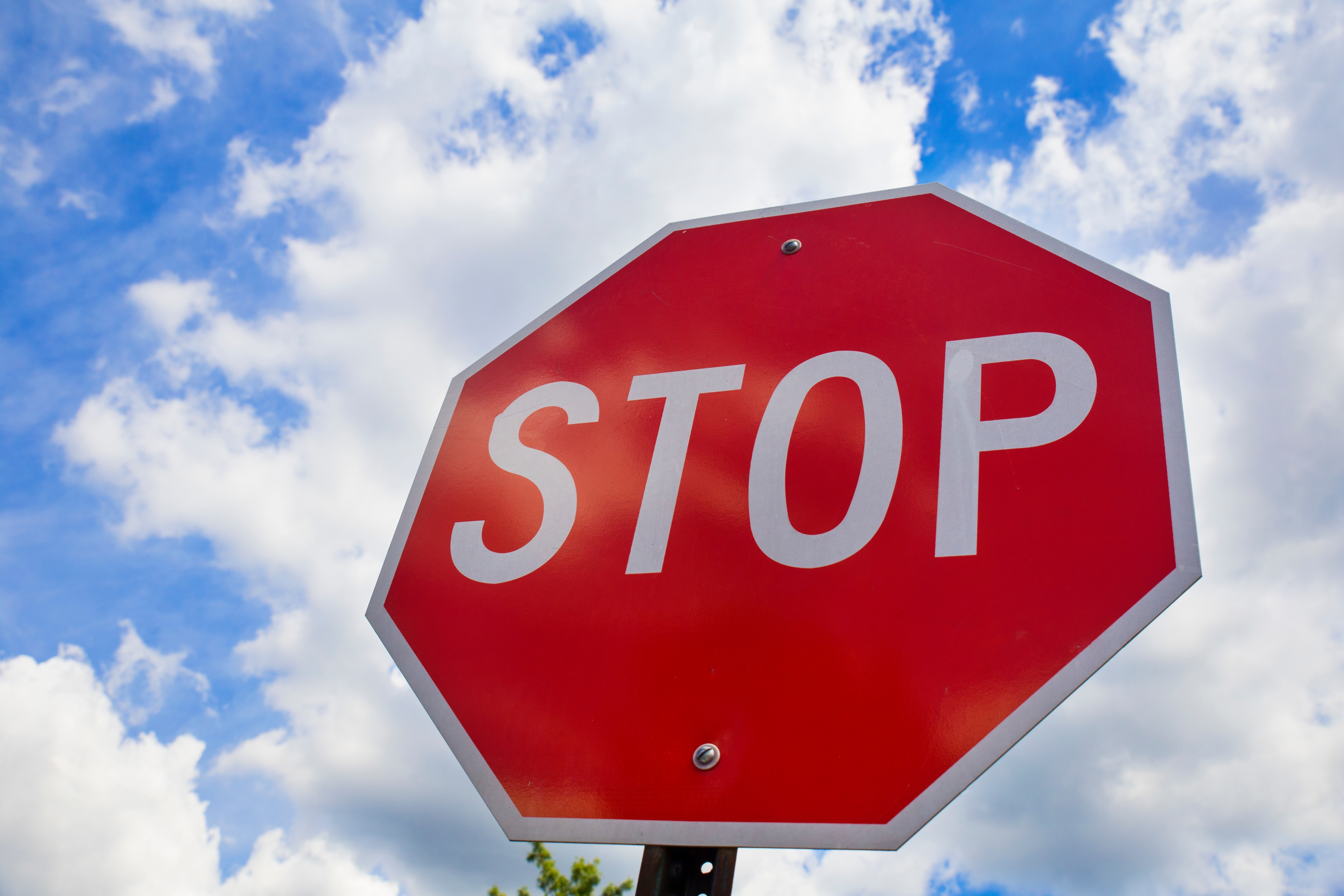 red-stop-sign-on-the-street-roadside-traffic-for-2023-11-27-04-49-10-utc.jpg